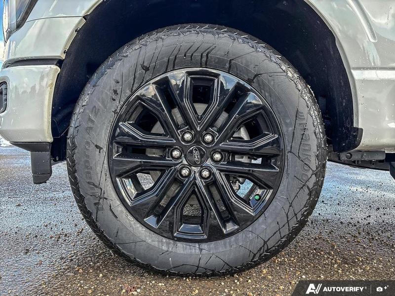 NEW 2026 Ford F-150 LARIAT - Star White Tri-coat Metallic Exterior / BLACK ACTIVE X Interior - $91,594 - Stock #E60564 - VIN 1FTFW5L85TFA11925 - Photo 6