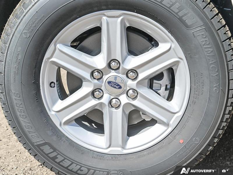 NEW 2026 Ford F-150 XLT - Oxford White Exterior / MEDIUM DARK SLATE CLOTH Interior - $70,014 - Stock #E60345 - VIN 1FTFW3L55TKD33742 - Photo 6