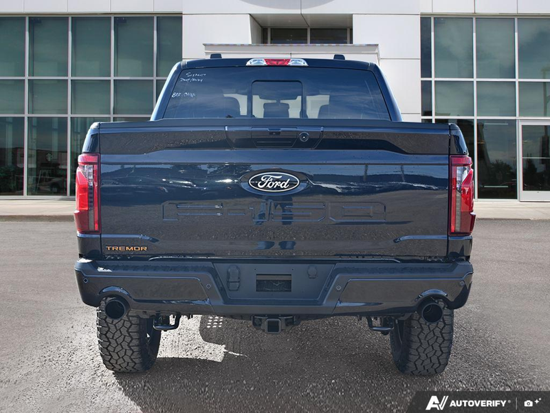NEW 2026 Ford F-150 Tremor - Antimatter Blue Metallic Exterior / BLACK, UNIQUE SPORT CLOTH 40/CONSOLE/40 POWER FRONT SEAT Interior - $74,949 - Stock #E61089 - VIN 1FTFW4L5XTFC08671 - Photo 5