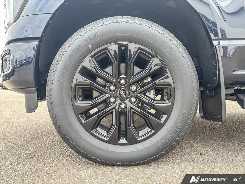 NEW 2026 Ford F-150 LARIAT - Antimatter Blue Metallic Exterior / BLACK ACTIVE X Interior - $88,762 - Stock #E60900 - VIN 1FTFW5L84TFB69768 - Photo 6