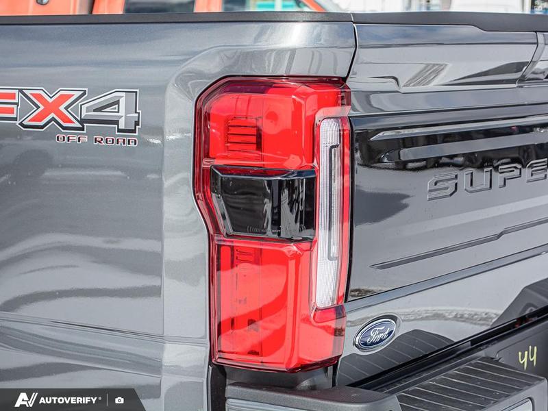 NEW 2026 Ford F-350 Super Duty Platinum - Carbonized Grey Metallic Exterior / BLACK ONYX/BLUE LEATHER Interior - $121,361 - Stock #D60348 - VIN 1FT8W3BT2TEE05424 - Photo 12