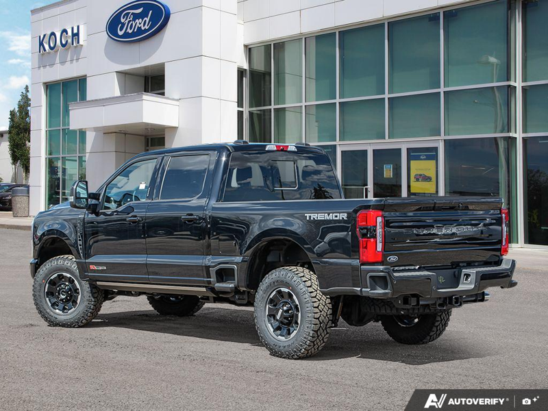 NEW 2026 Ford F-350 Super Duty Platinum Tremor - Agate Black Exterior / BLACK ONYX/BLUE LEATHER Interior - $125,720 - Stock #E60283 - VIN 1FT8W3BM8TED60496 - Photo 4