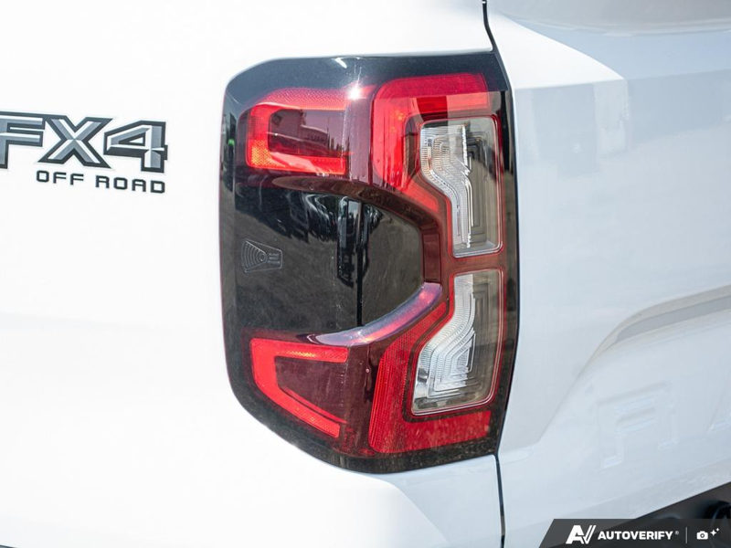 NEW 2026 Ford Ranger XLT - Oxford White Exterior / EBONY PREMIUM CLOTH Interior - $56,913 - Stock #E60297 - VIN 1FTER4HP7TLE04386 - Photo 12