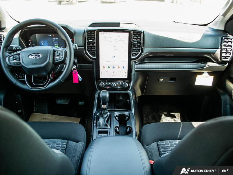 NEW 2026 Ford Ranger XLT - Oxford White Exterior / EBONY PREMIUM CLOTH Interior - $56,913 - Stock #E60297 - VIN 1FTER4HP7TLE04386 - Photo 27