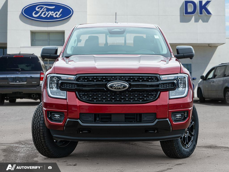 NEW 2026 Ford Ranger XLT - Ruby Red Tri-coat Metallic Exterior / EBONY PREMIUM CLOTH Interior - $56,083 - Stock #D60201 - VIN 1FTER4HH2TLE03526 - Photo 2