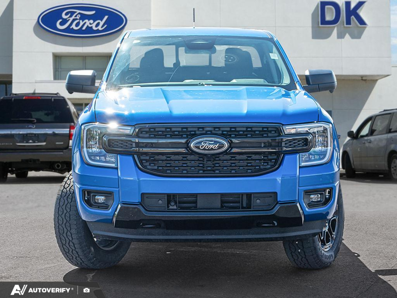 NEW 2026 Ford Ranger XLT - Velocity Blue Metallic Exterior / EBONY PREMIUM CLOTH Interior - $54,185 - Stock #D60613 - VIN 1FTER4HH0TLE29901 - Photo 2