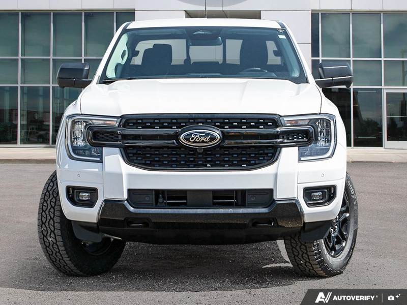 NEW 2026 Ford Ranger XLT - Oxford White Exterior / EBONY PREMIUM CLOTH Interior - $56,913 - Stock #E60310 - VIN 1FTER4HP2TLE04246 - Photo 2
