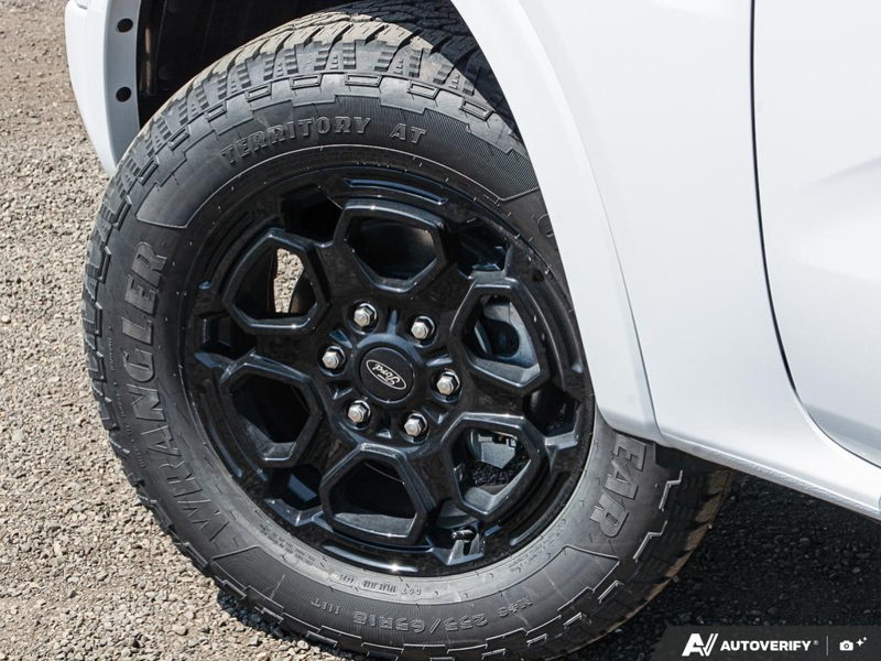 NEW 2026 Ford Ranger XLT - Oxford White Exterior / EBONY PREMIUM CLOTH Interior - $56,913 - Stock #E60297 - VIN 1FTER4HP7TLE04386 - Photo 6